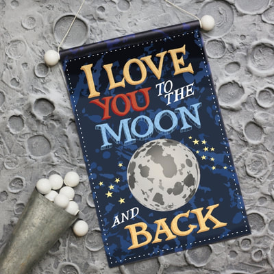 Boys room banner wall art in a space theme entitled I love you to the moon and back.