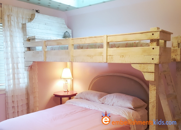 Custom loft bed made of reclaimed fir for a girls bedroom by Aaron Christensen, the kids designer.