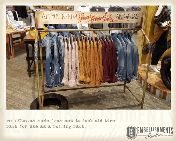 Store autumn display fixture made to ressemble a tire merchandising rack.  It's perfect for a clothing rolling rack!
