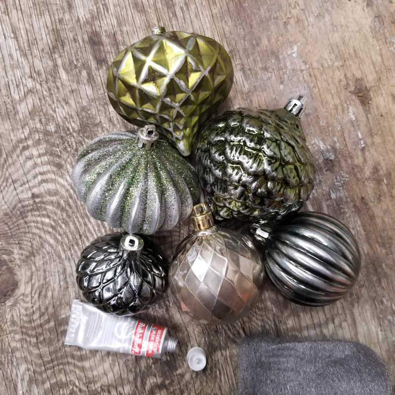Mimic vintage ornaments by using Rub-n-Buff paste wax to highlight and distress cheap ornaments by Aaron Christensen